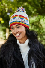 Load image into Gallery viewer, luscious scarves wool hat Pachamama Rainbow Heart Bobble Beanie Oatmeal, Handmade, Fairtrade
