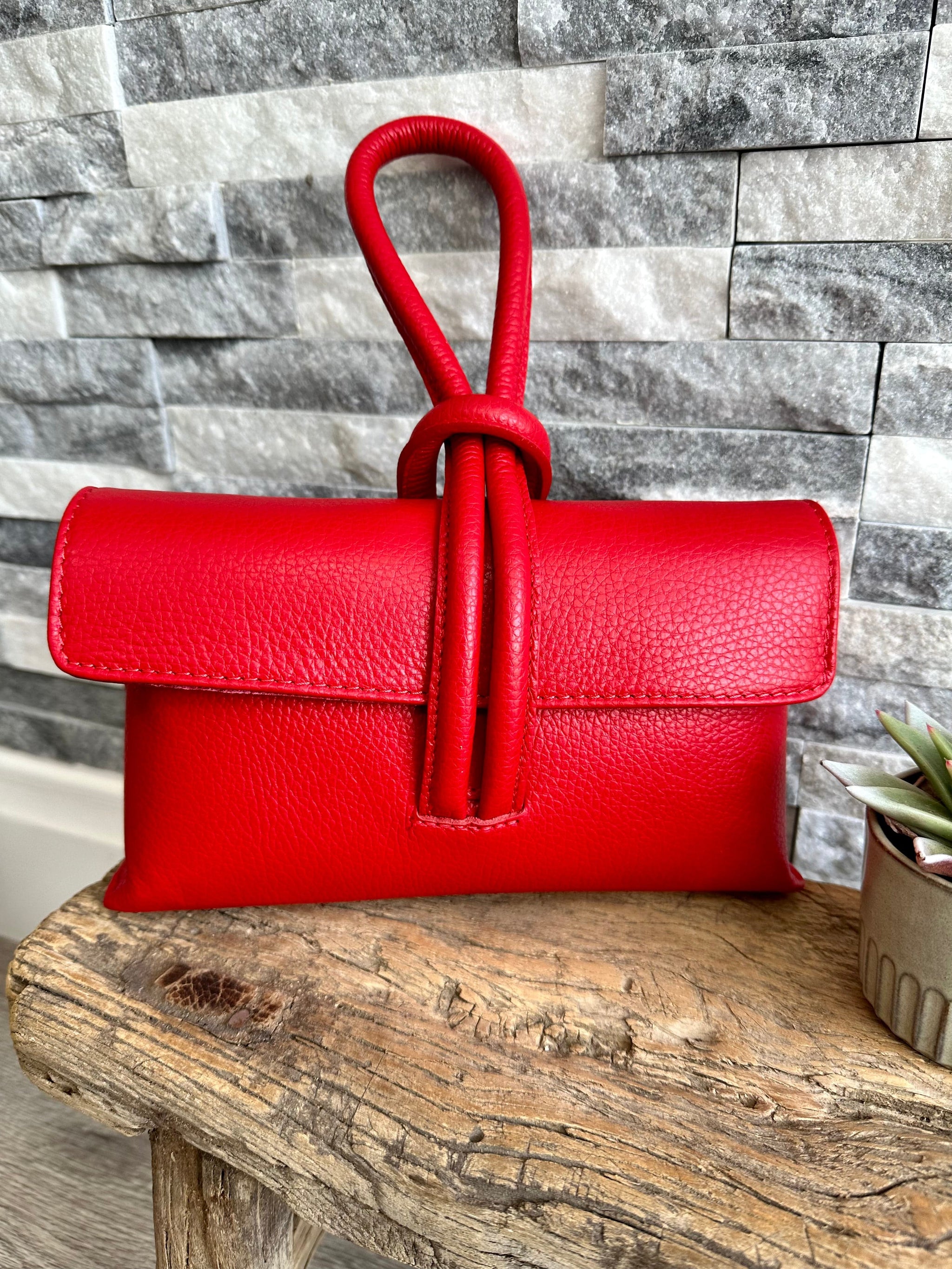 Red and silver clutch bag on sale